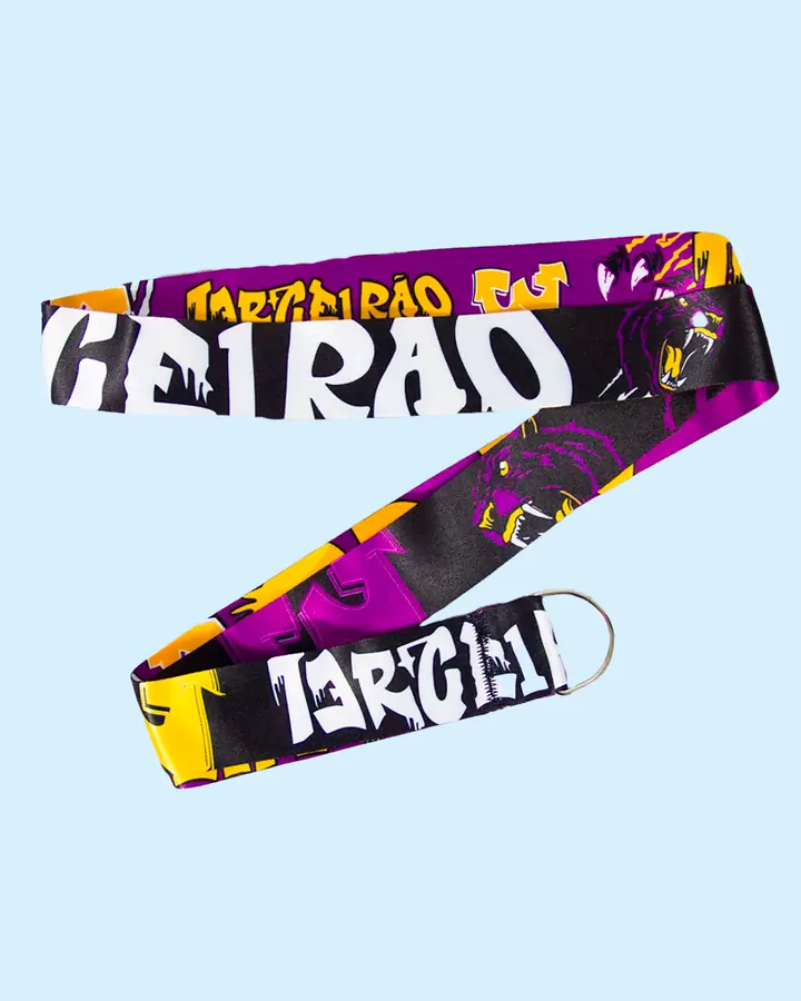 Tirante de terceirão com a arte da turma em roxo, amarelo e preto, com argola de metal