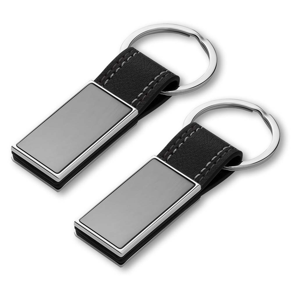 Chaveiro de metal com detalhe em PU na cor Preto, personalizado com a logo da empresa