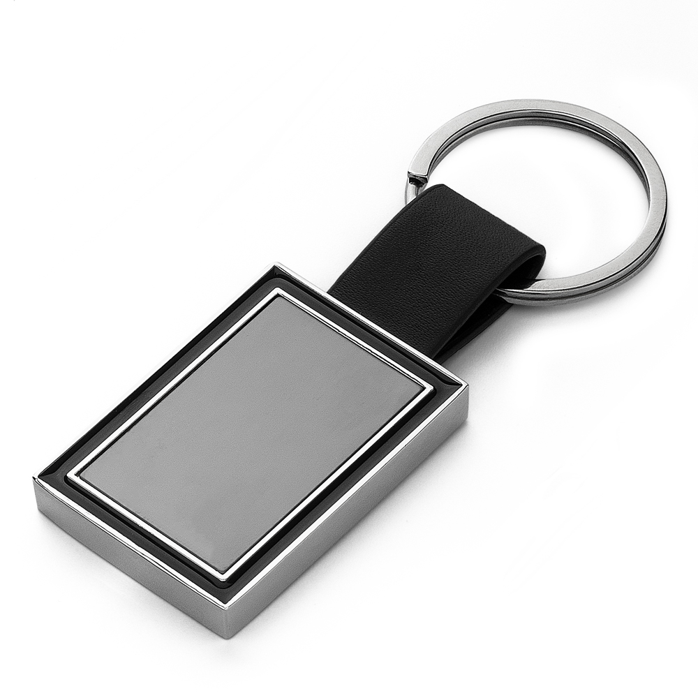 Chaveiro de metal com detalhe em PU na cor Grafite, personalizado com a logo da empresa